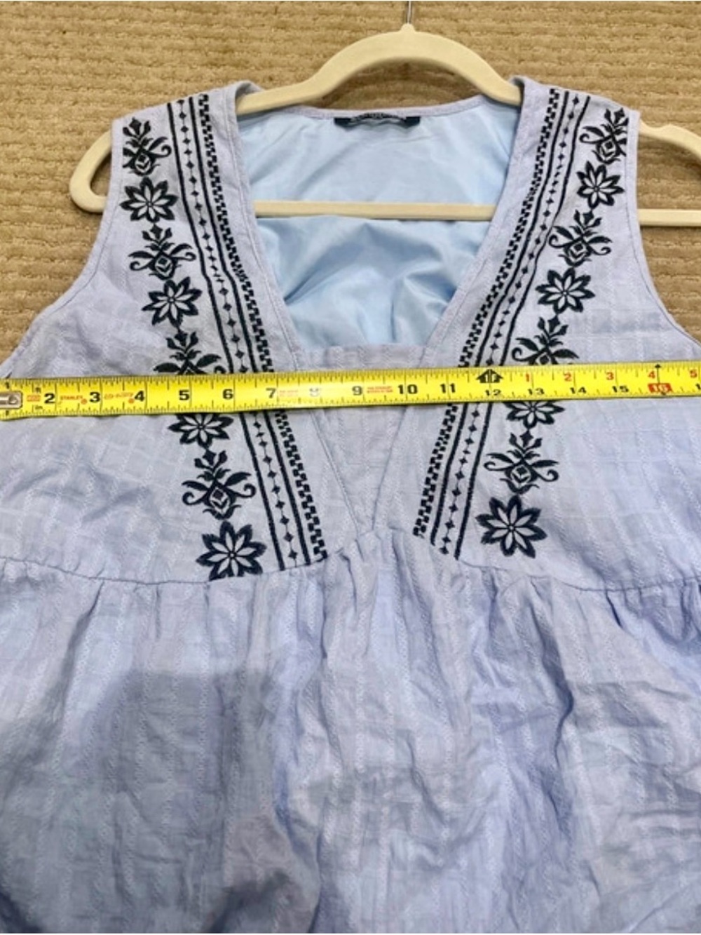 BloomChic Light Blue Sleeveless Embroidered V-Neck Peplum Top